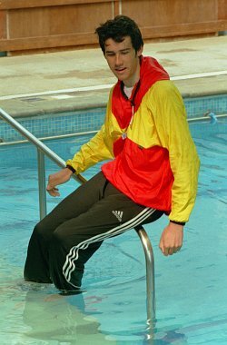 lifeguard in pool wearing an anorak